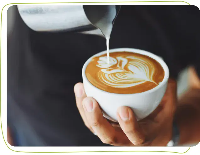 Dorfmilch geniessen in einem leckeren Cappuncino